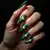 Velvet Green Oval Nails: A Retro Winter Aesthetic