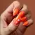 Sunny Orange Moon Nails: A Spring Stone Aesthetic