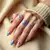 Rainbow Chrome Winter Nails: A Short, Elegant Design