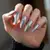 Silver Chrome Shattered Glass Nails: Decoding the Meaning