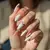 Boho White Chrome Arrowhead Nails for Neutral Skin Tones