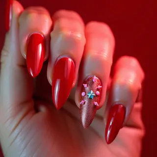 Festive Red Arrowhead Nails: Christmas Tattoo Style!