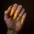 What Do Yellow Nails Symbolize? Cinnamon & Rhinestone Goth Style