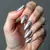 Master the Cat Eye Technique: Gray Chrome Almond Nails